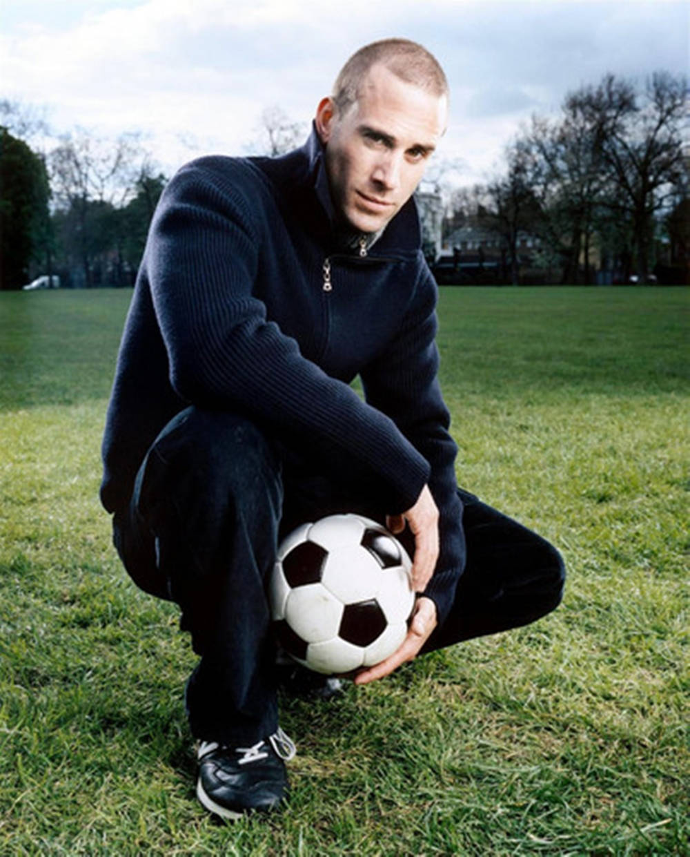 Joseph Fiennes With A Football Background