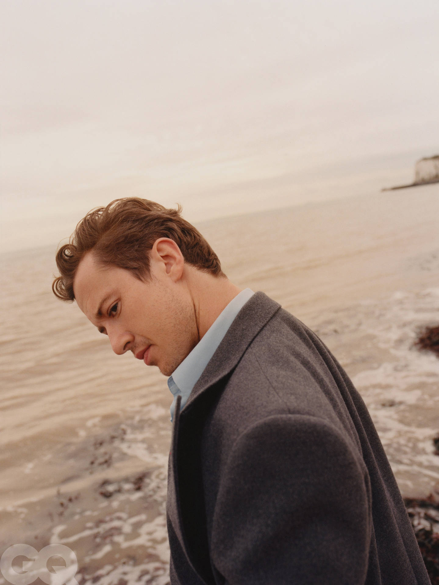 Joseph Quinn Posing Near Beach