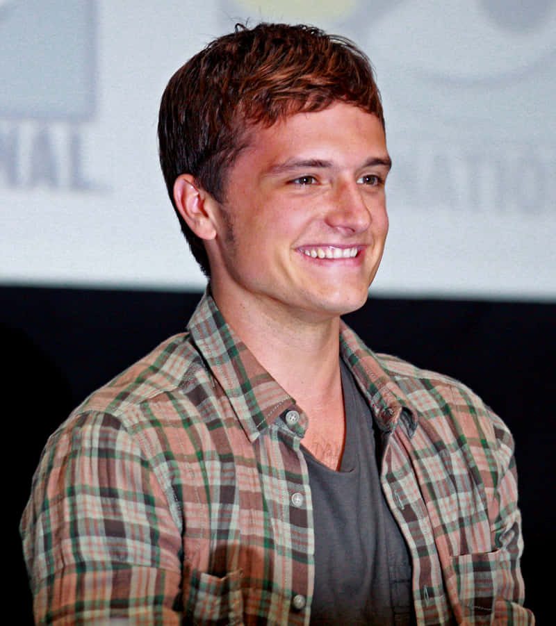 Josh Hutcherson Smiling Plaid Shirt Background