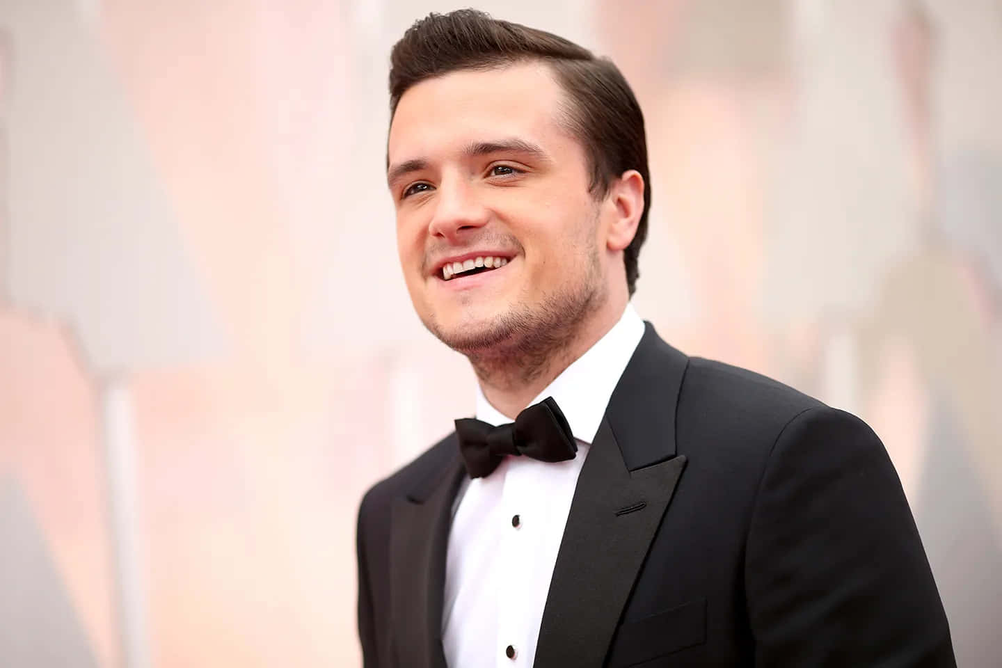 Josh Hutcherson Smilingin Tuxedoat Event.jpg Background