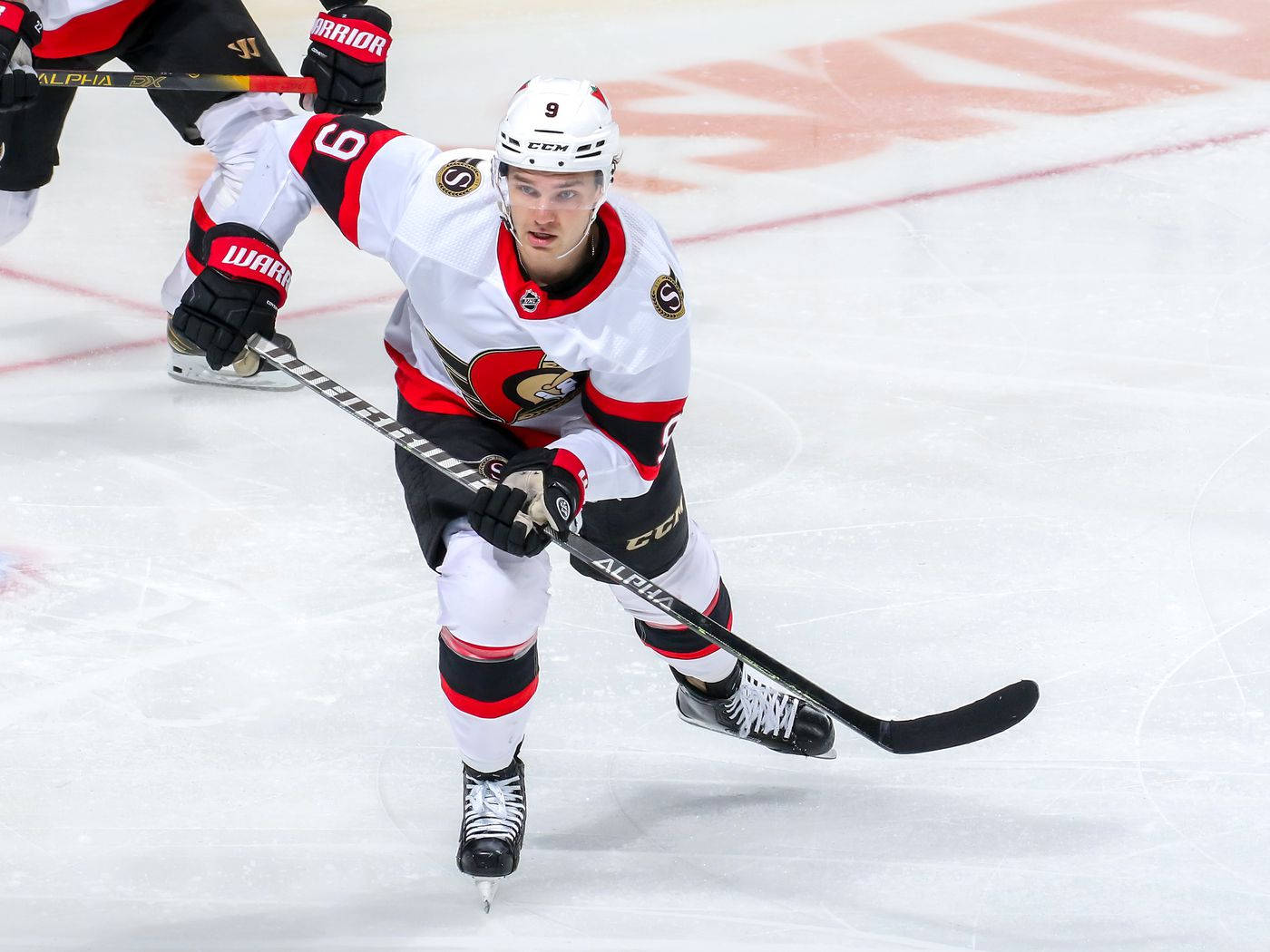 Josh Norris In Action For The Ottawa Senators Background