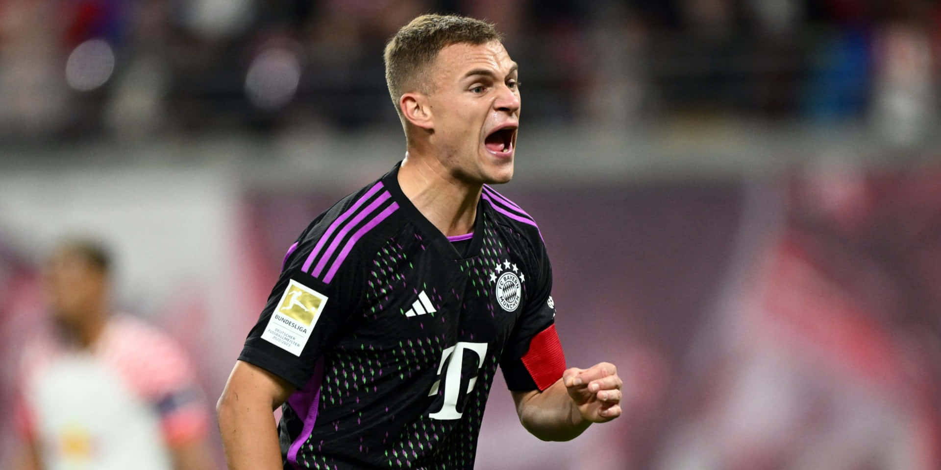 Joshua Kimmich In Action During Match Background