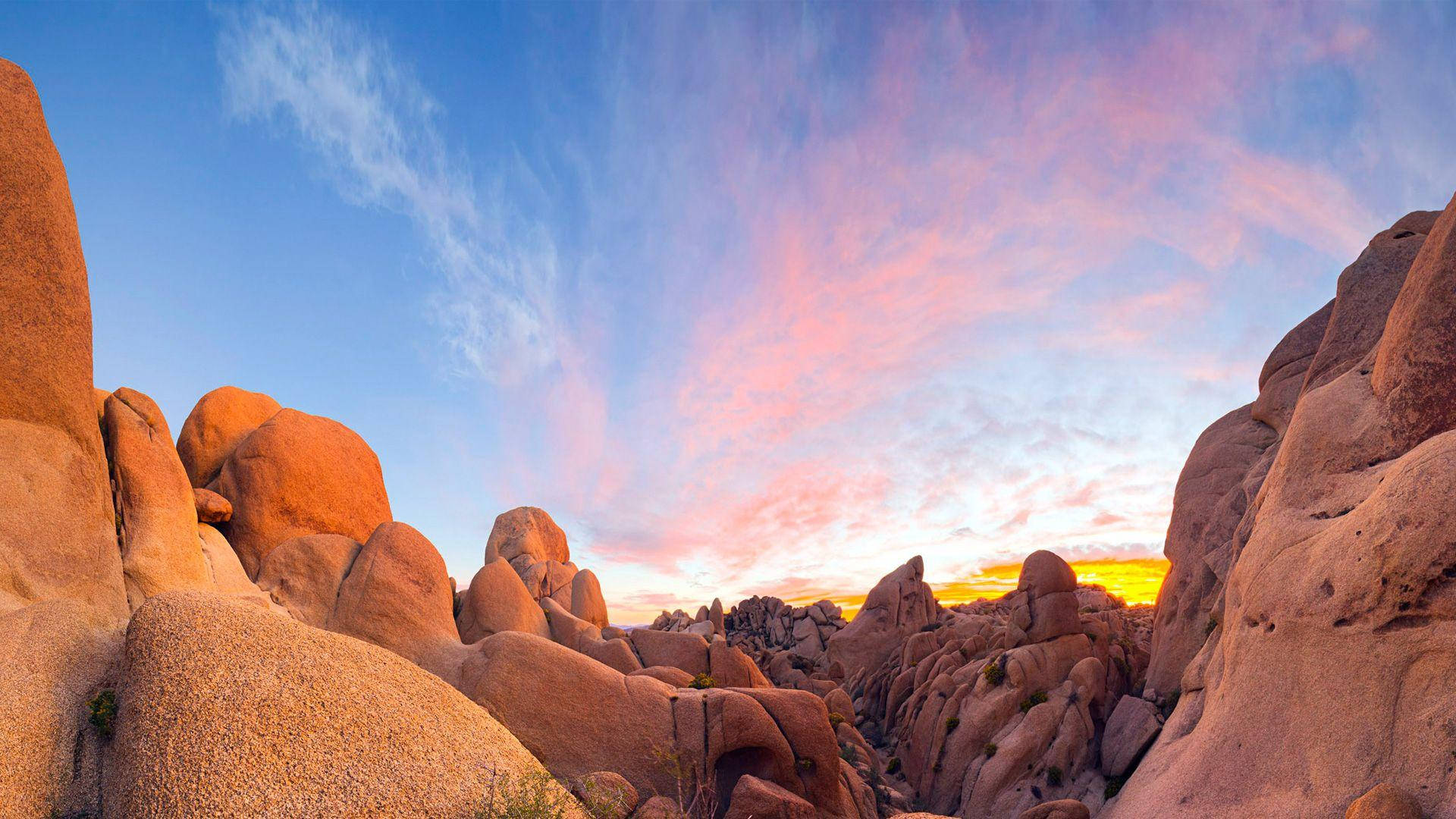 Joshua Tree National Park Red Rocks Pink Clouds Background