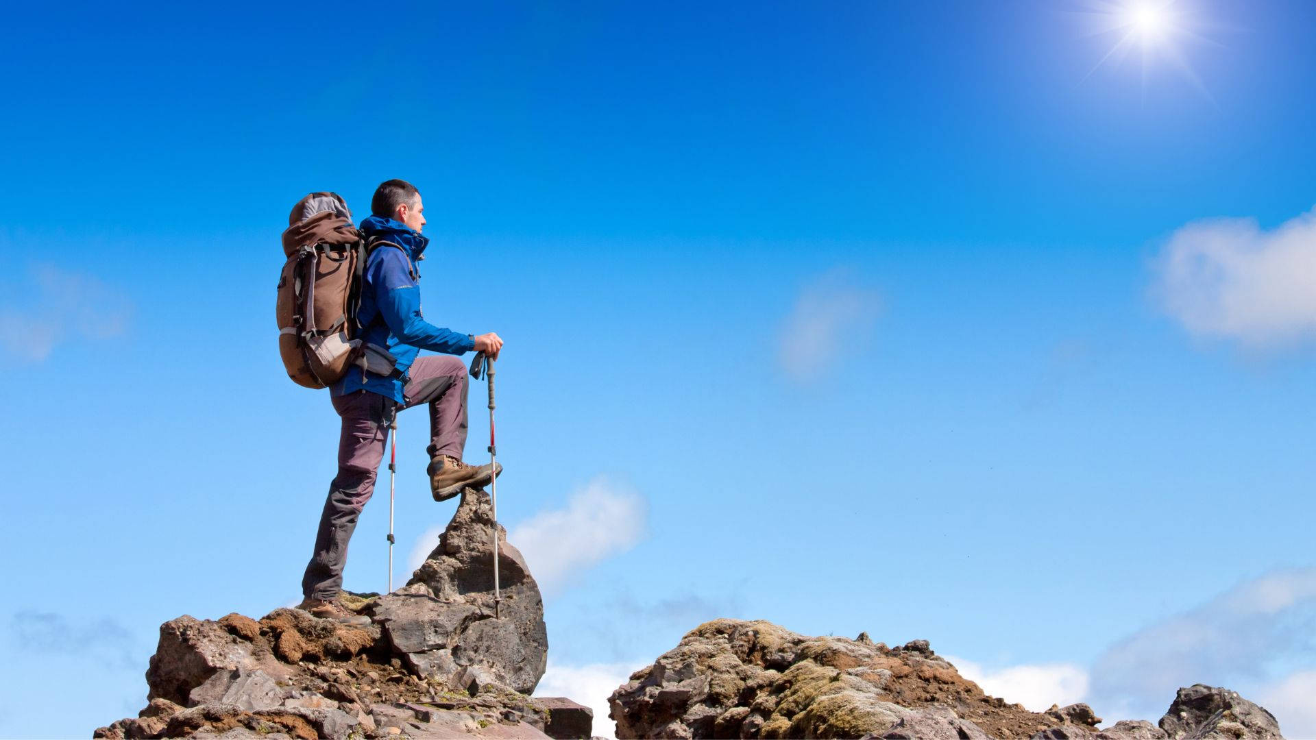 Journey Of Man Standing On Rock