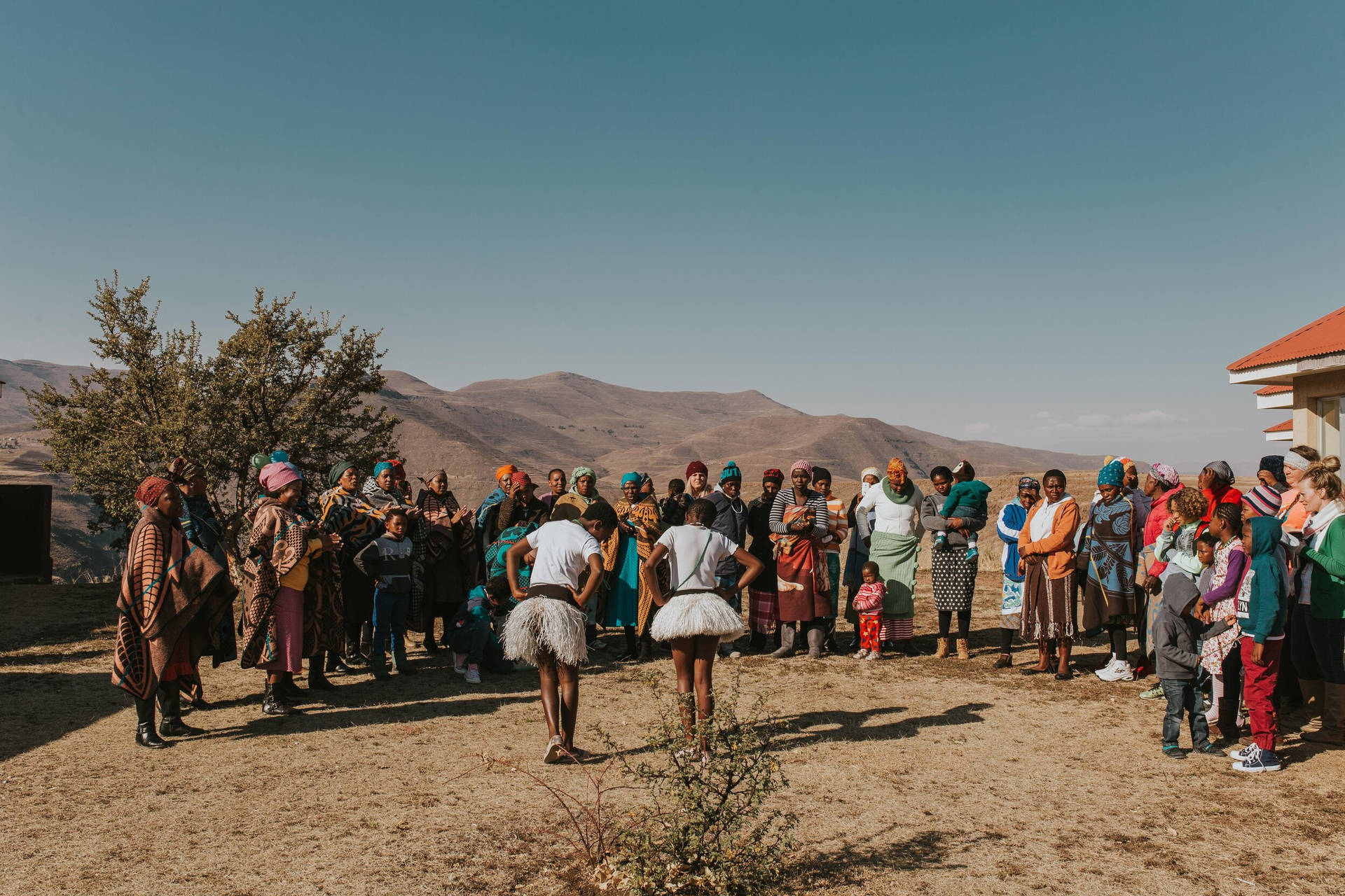 Joyful Gathering: Lesotho Girls Celebrating Tradition Through Dance