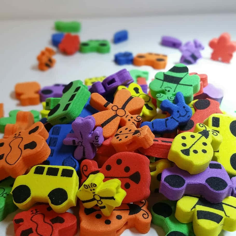 Joyful Learning - Little Child Playing With Educational Toys Background