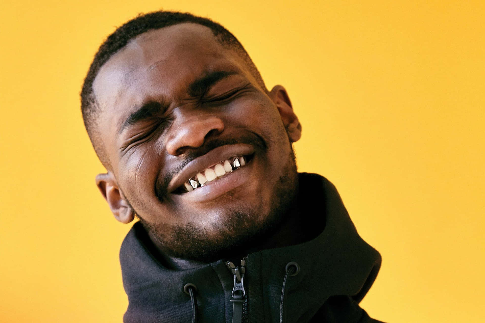 Joyful Man Squinting Smile Yellow Background Background