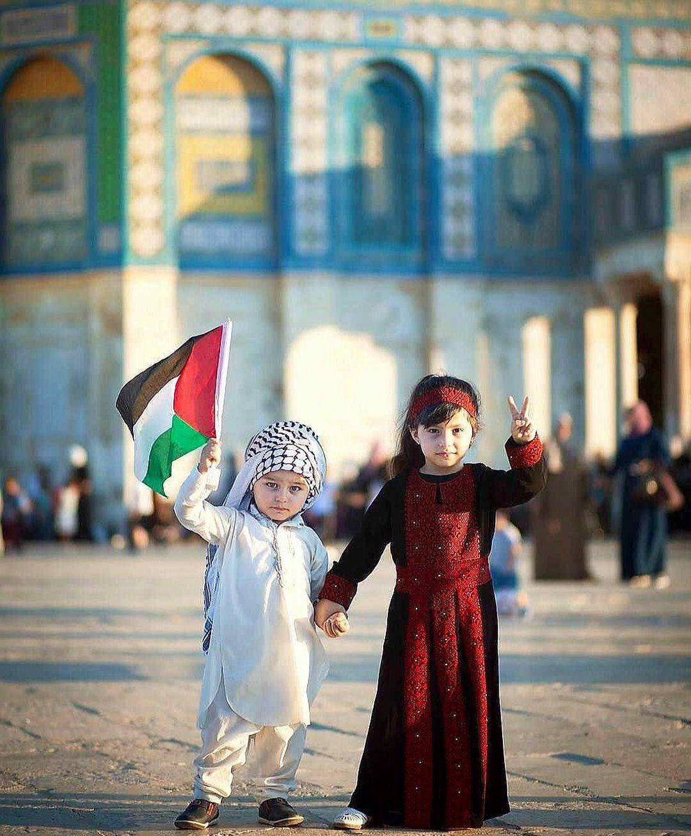 Joyful Palestinian Kids Celebrating Eid Al-fitr Background