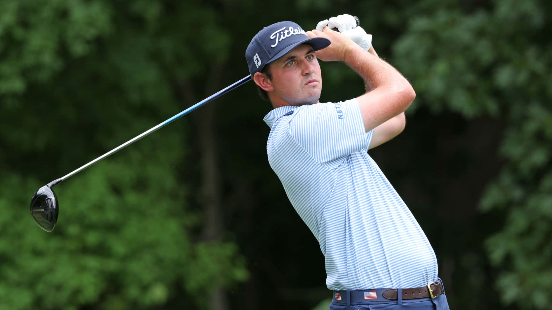 Jt Poston Golf Club Swinging Behind Background