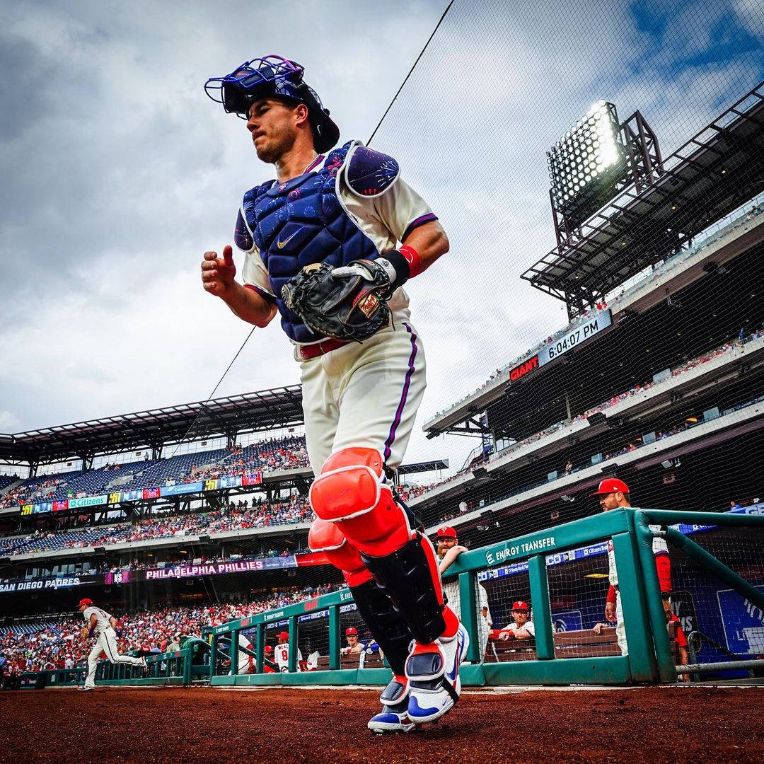 Jt Realmuto Jogging On The Field Background