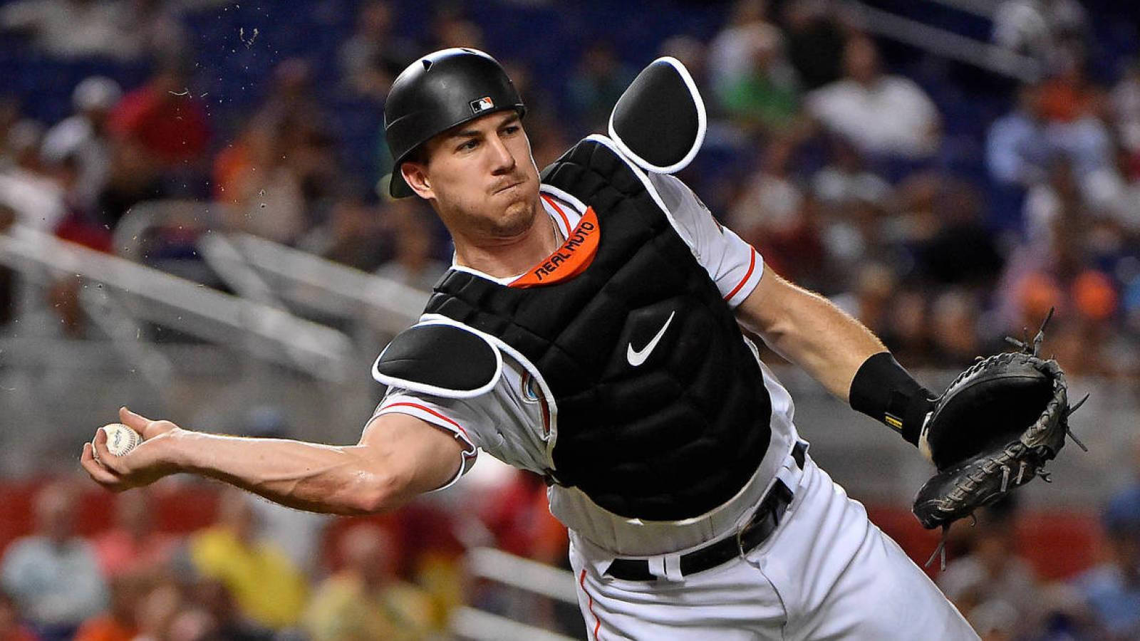 Jt Realmuto Ready To Throw Ball Background