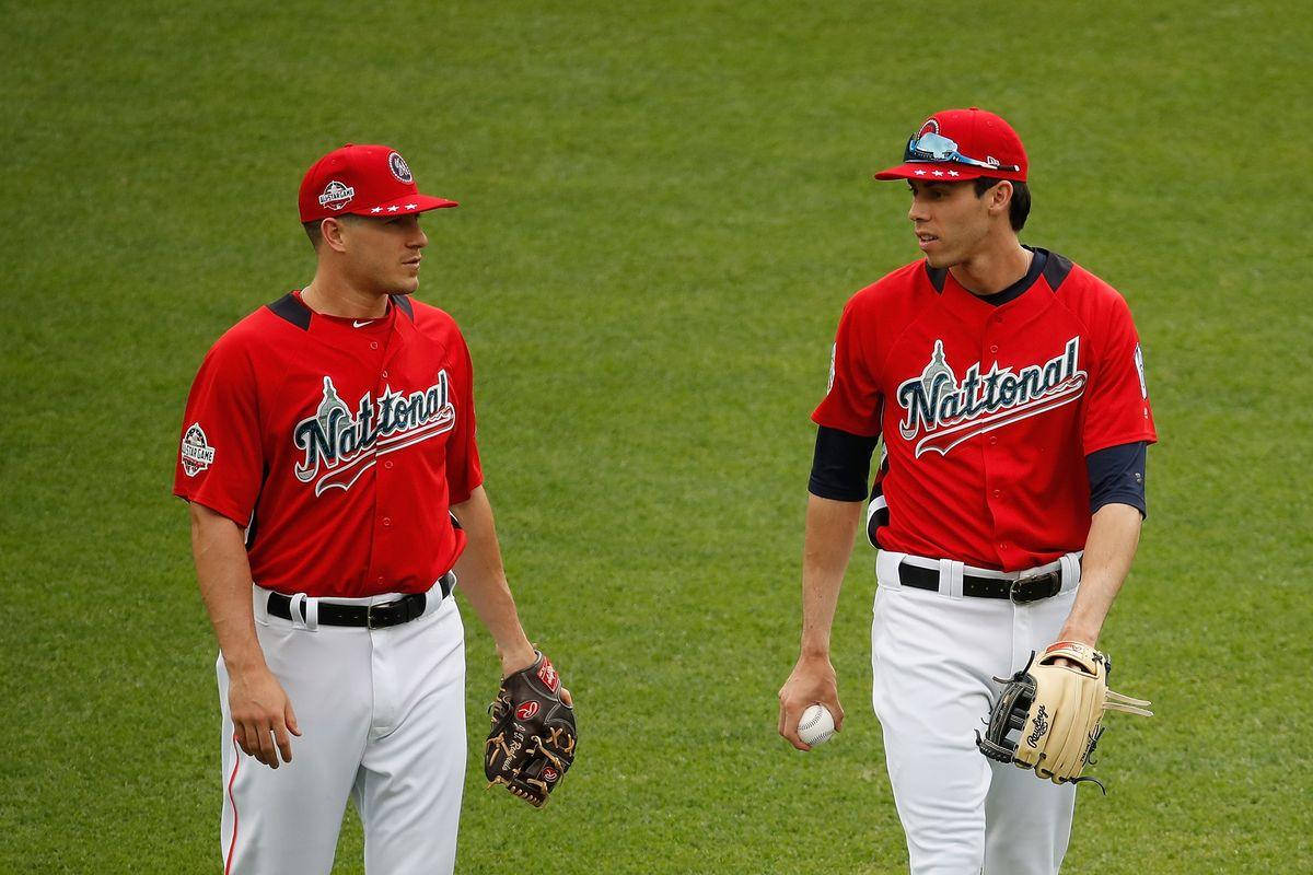 Jt Realmuto Talking To Teammate Background