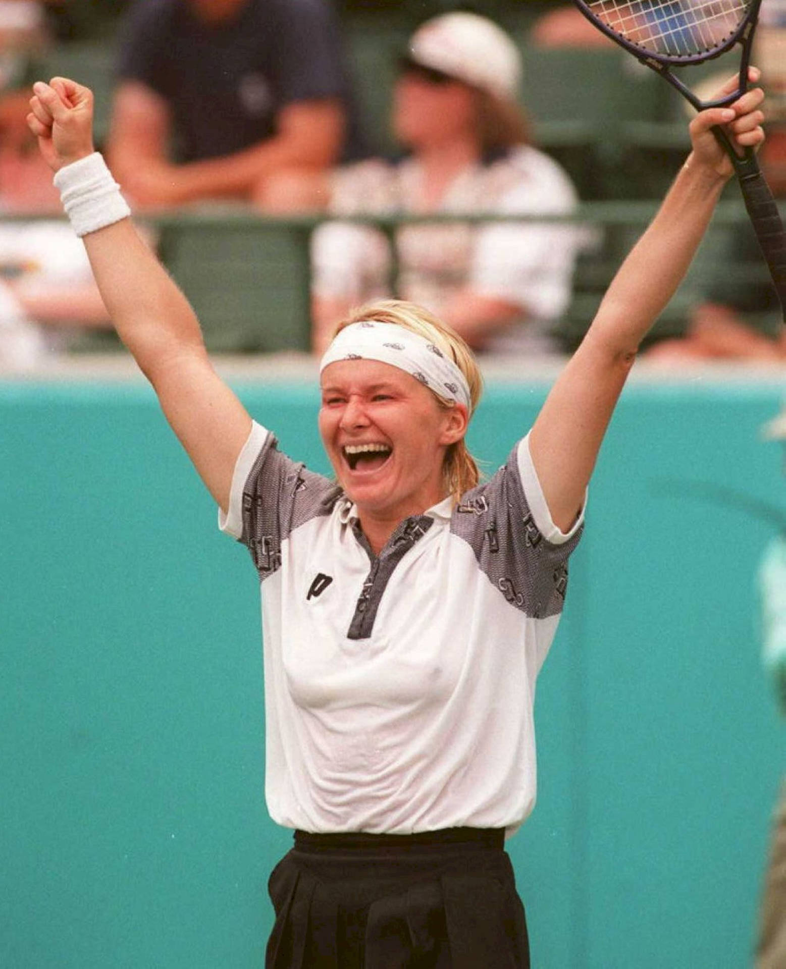 Jubilant Jana Novotna Raising Her Hands Triumphantly