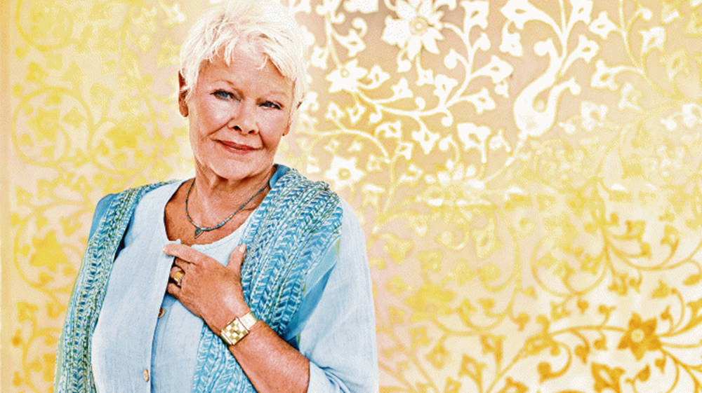 Judy Dench In Flowery Wall