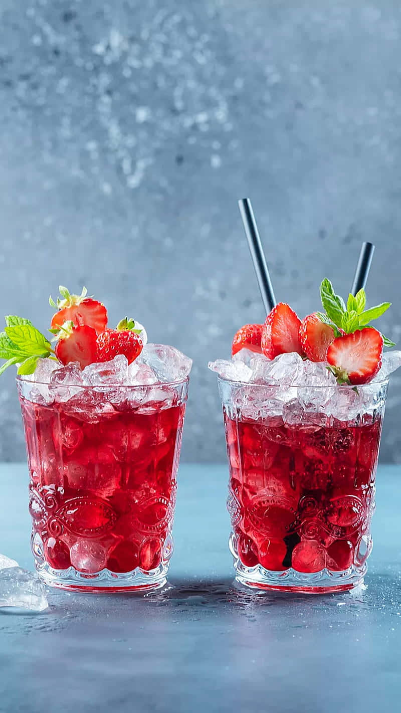 Juice Strawberry Flavor On Ice Background