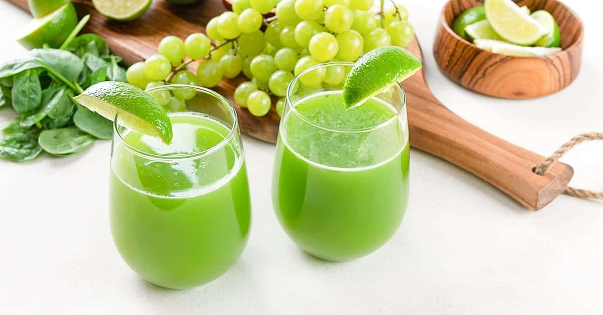 Juice With Lime And Green Grapes Background