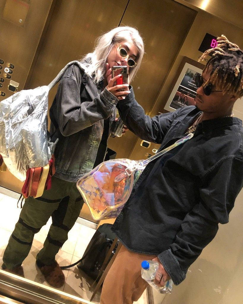 Juice Wrld And Ally In An Elevator Background