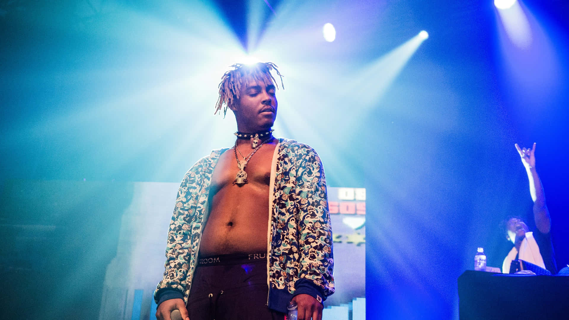 Juice Wrld Electrifies The Stage With His Dynamic Performance At A Concert. Background