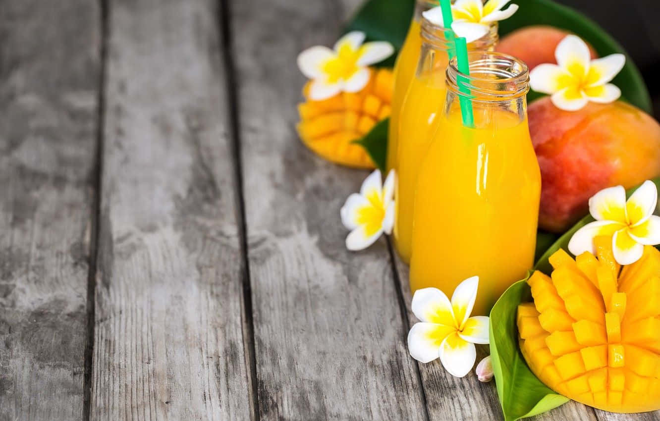 Juices With Mangoes And Flowers Background