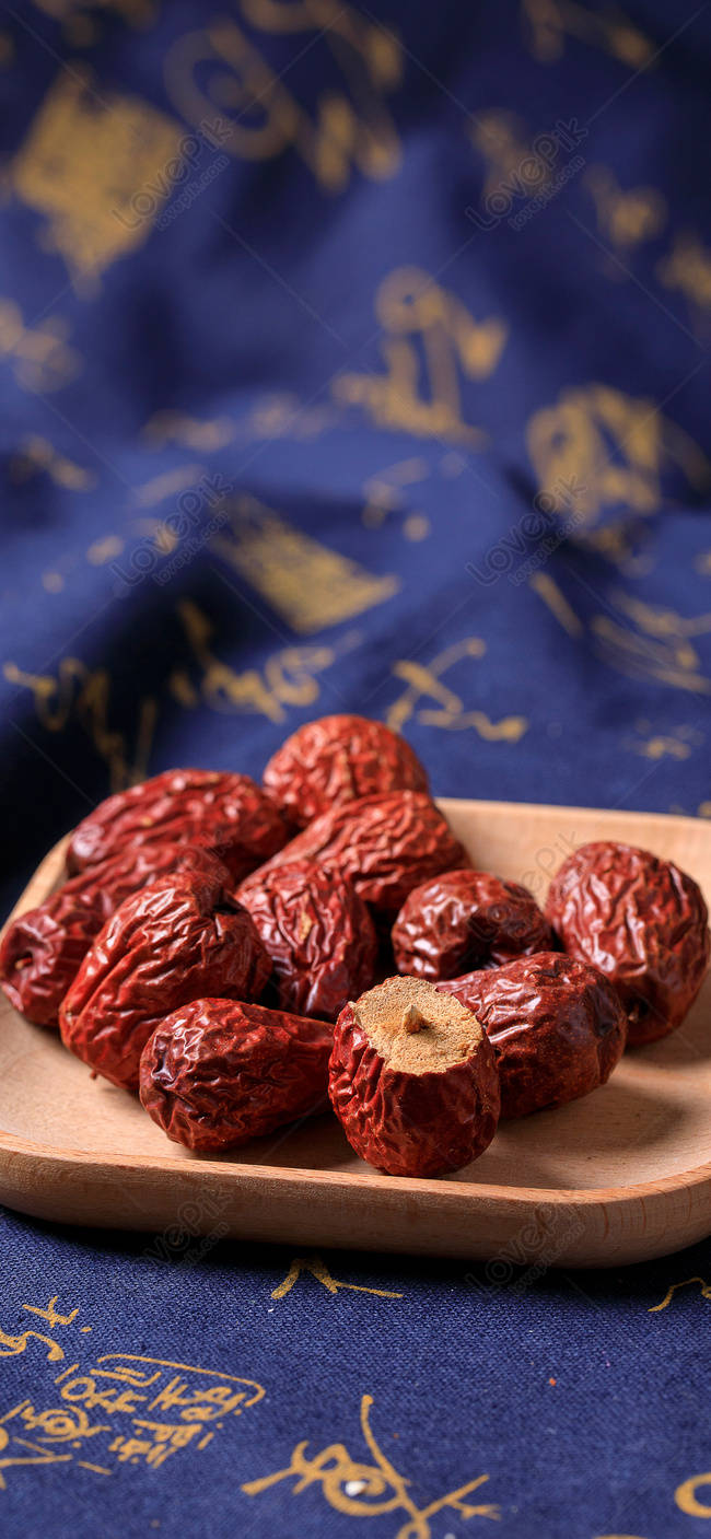 Jujube Seeds In Wooden Saucer Background