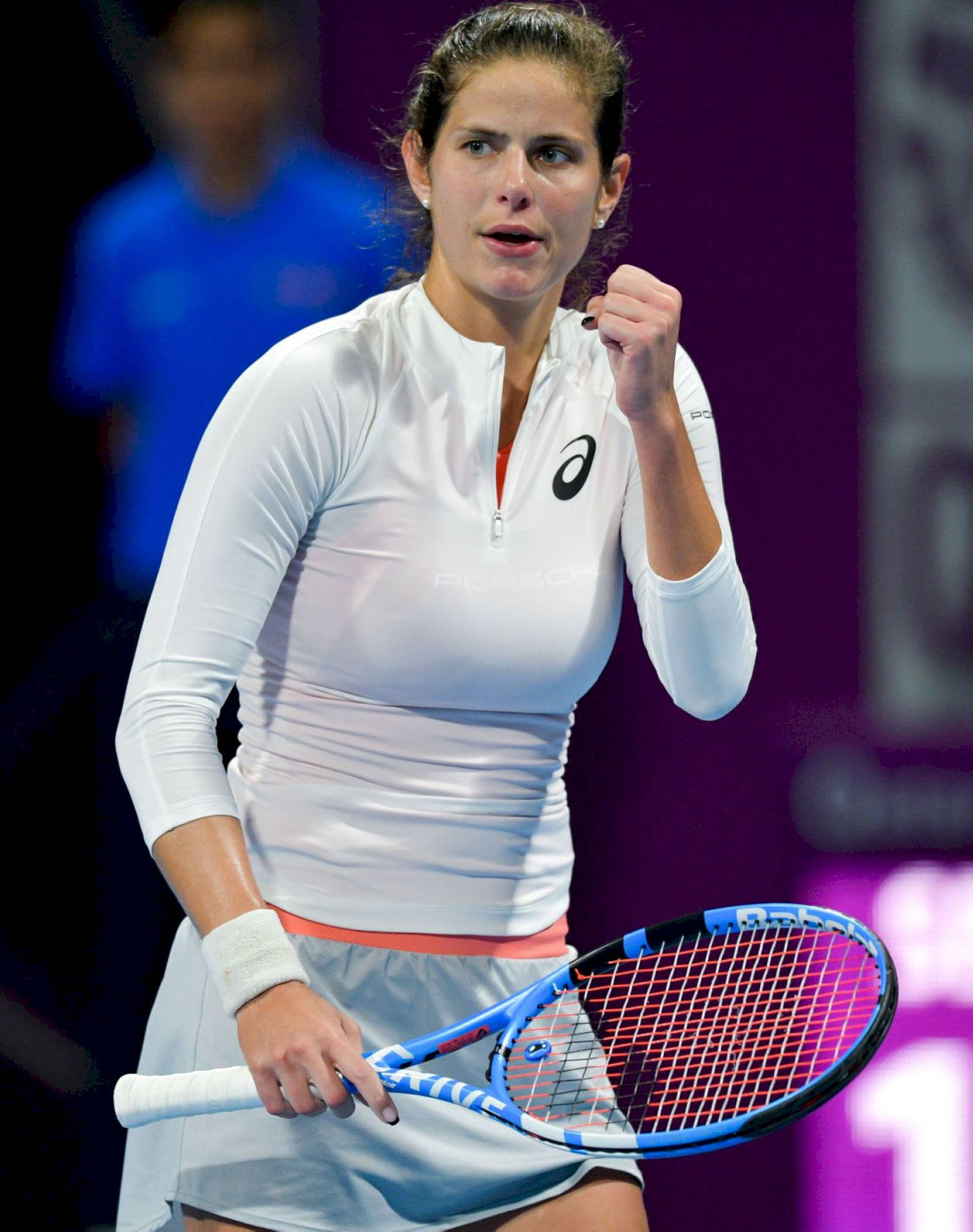 Julia Goerges Celebrates Victory On Court Background