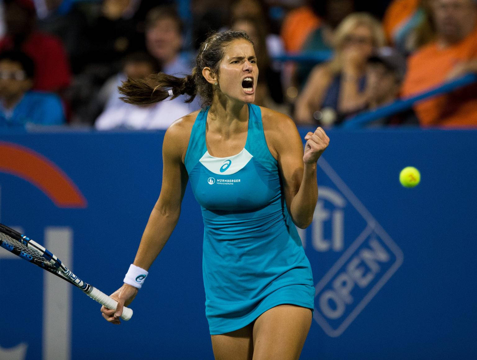 Julia Goerges Celebrating With A Fist Pump After A Victory Background