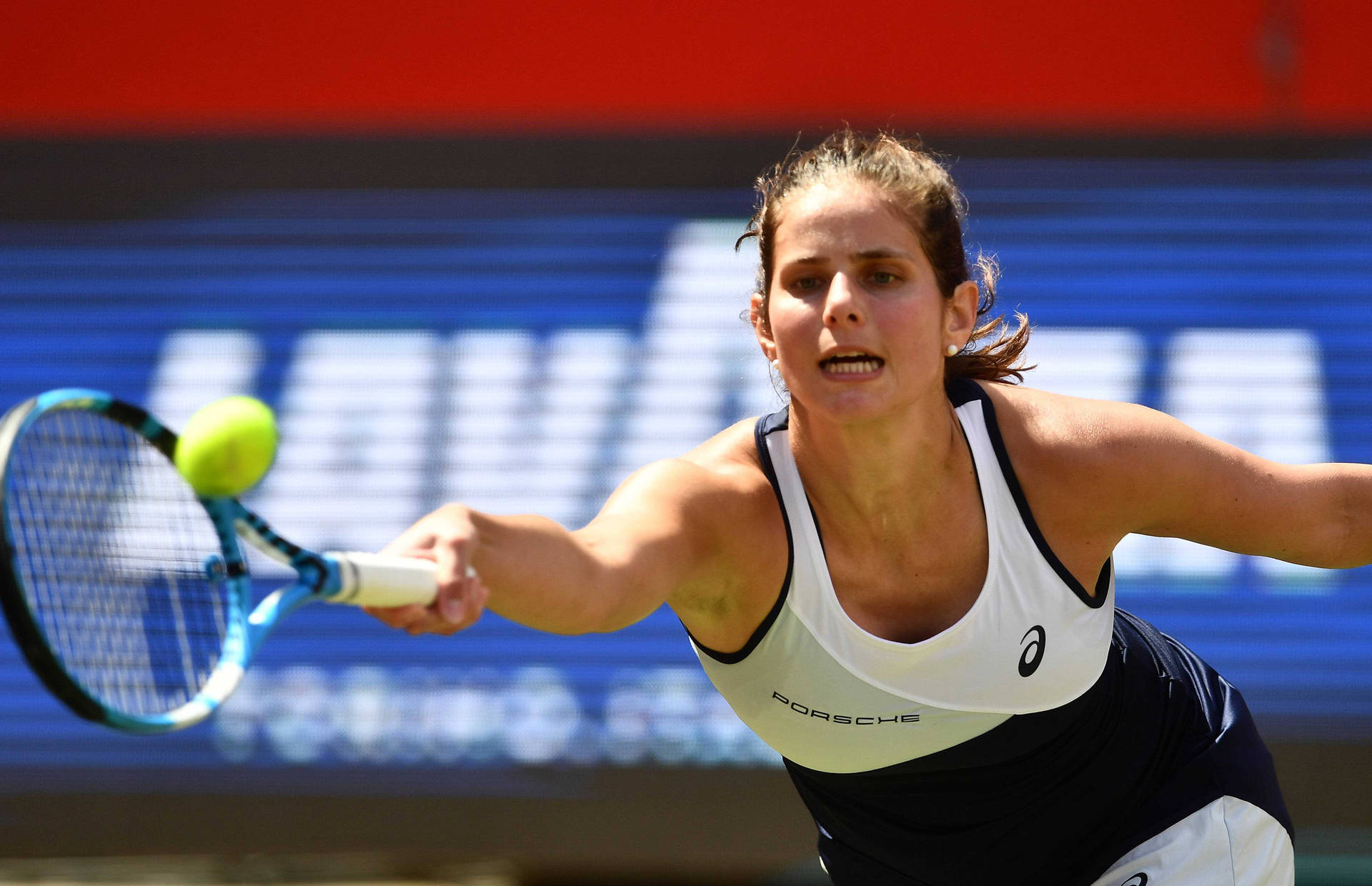 Julia Goerges Reaching Tennis Ball Background