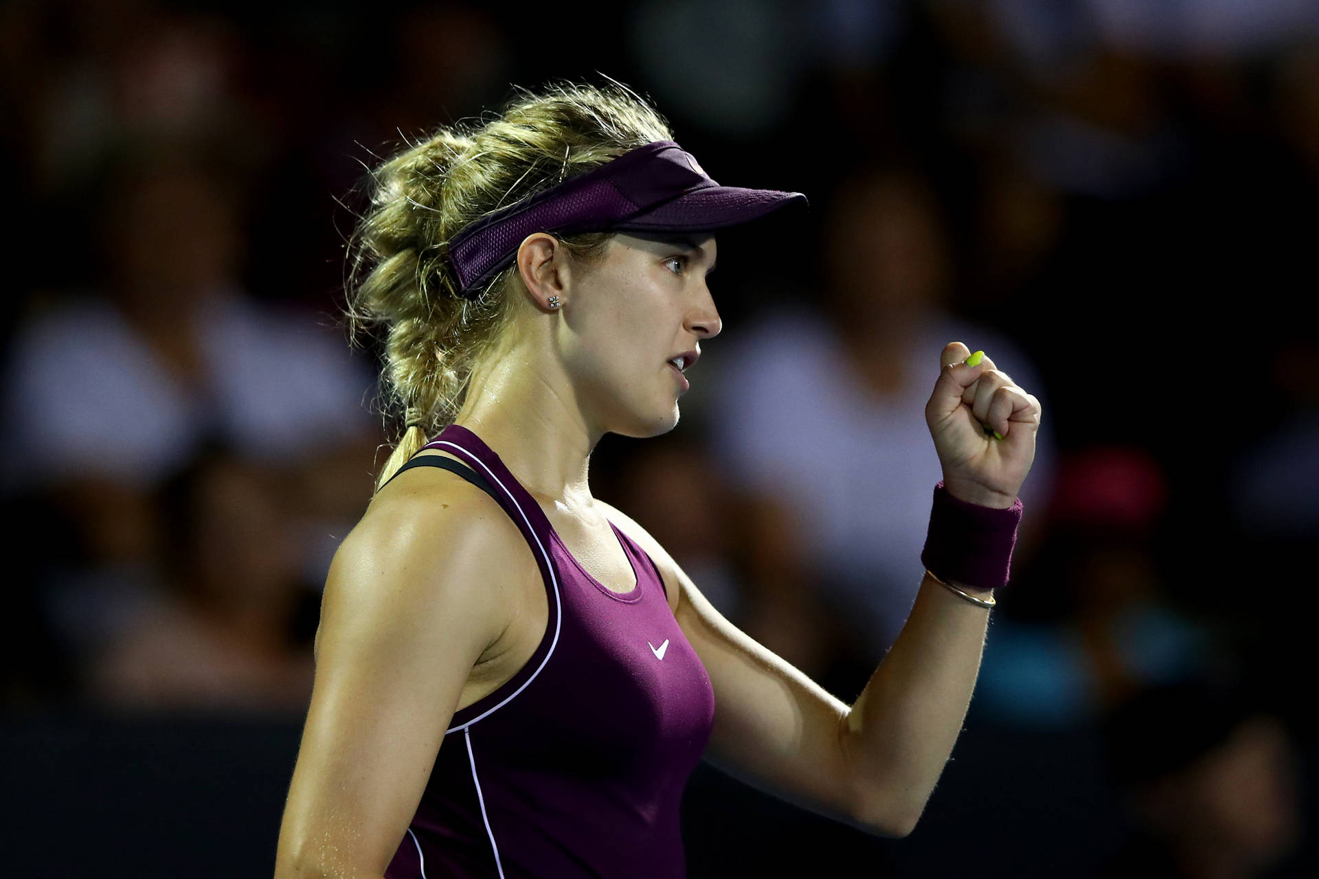 Julia Goerges Side Fist Pump Background