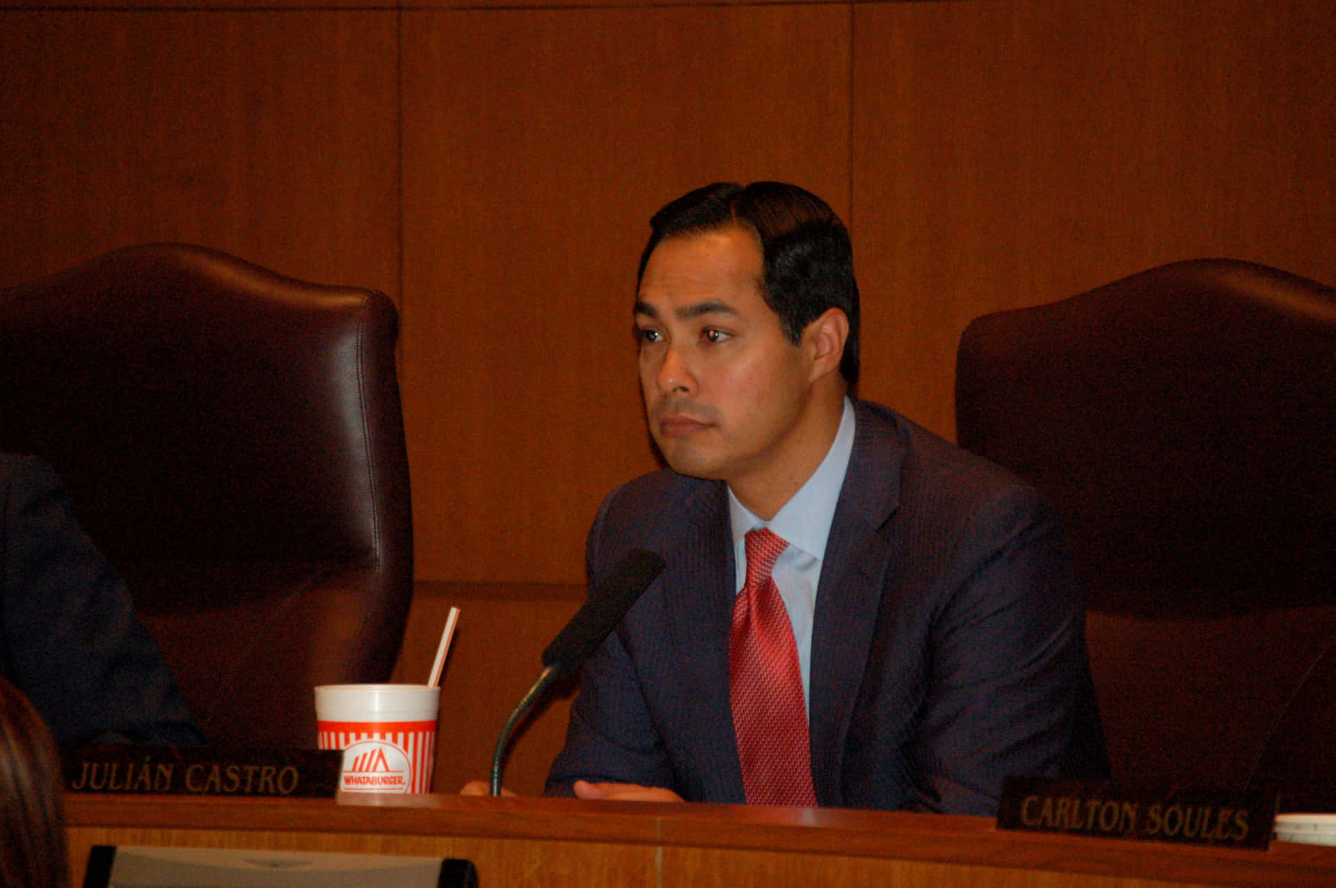 Julian Castro Sitting On His Chair Background