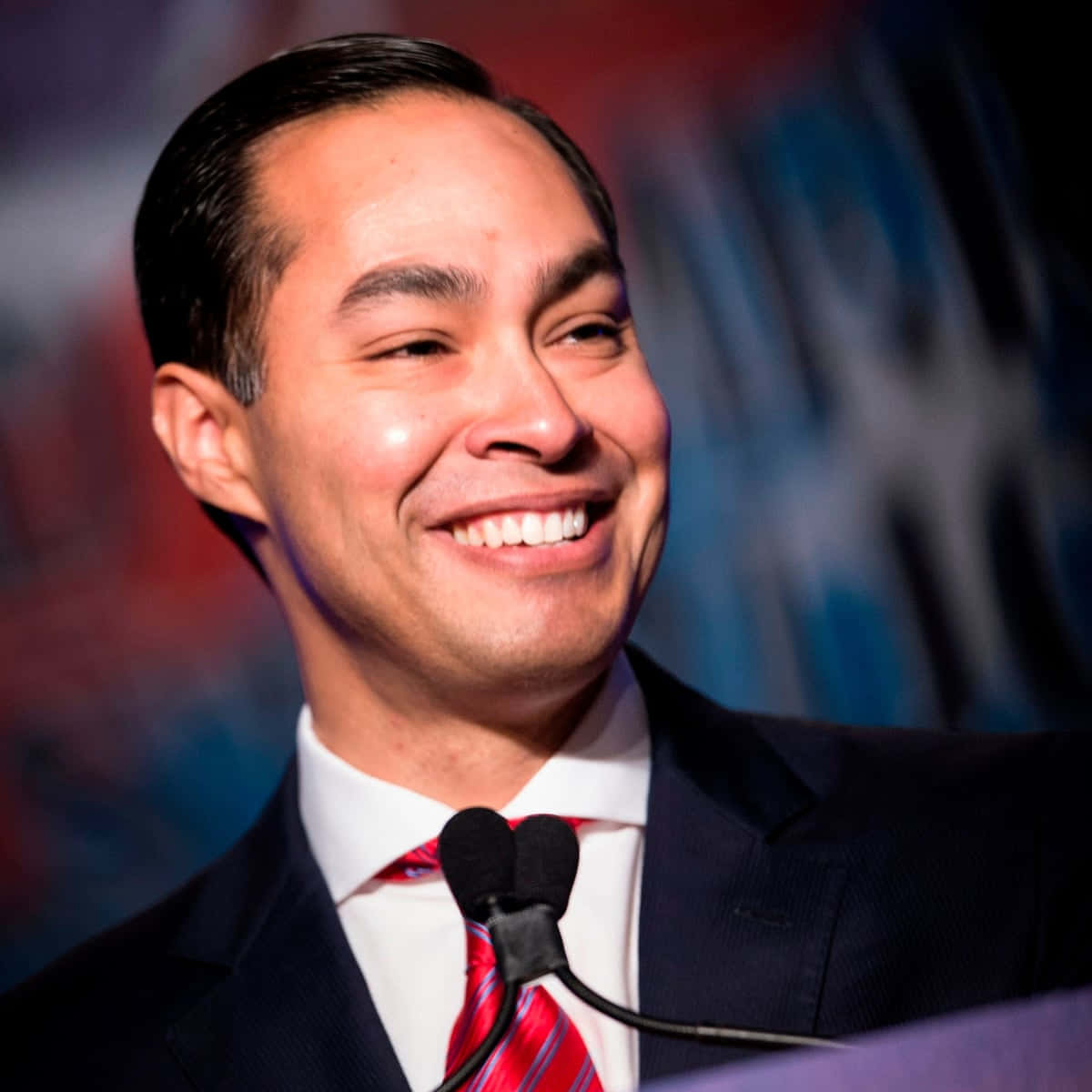 Julian Castro Smiling Widely With Teeth Background