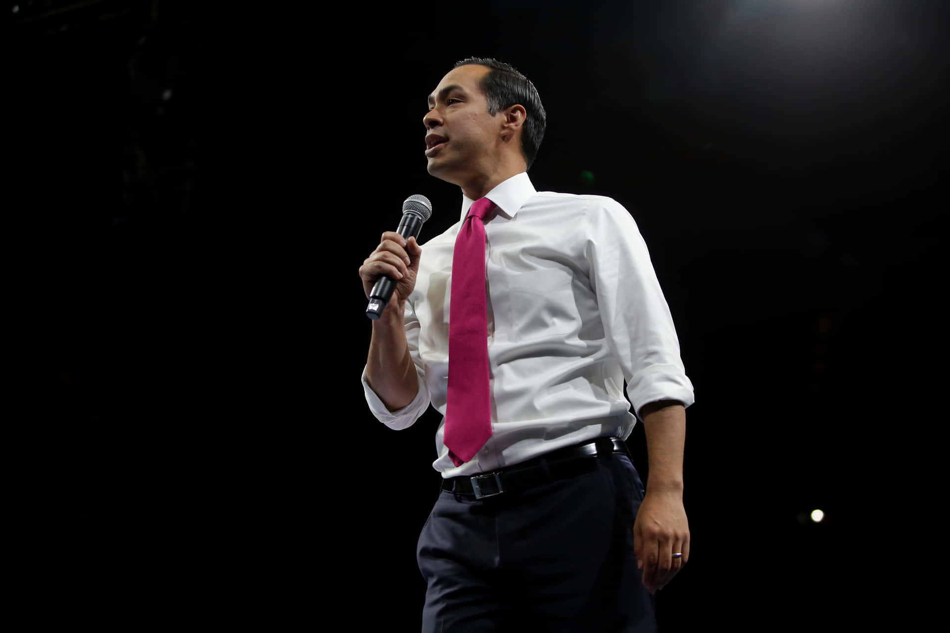 Julian Castro Standing While Holding Microphone