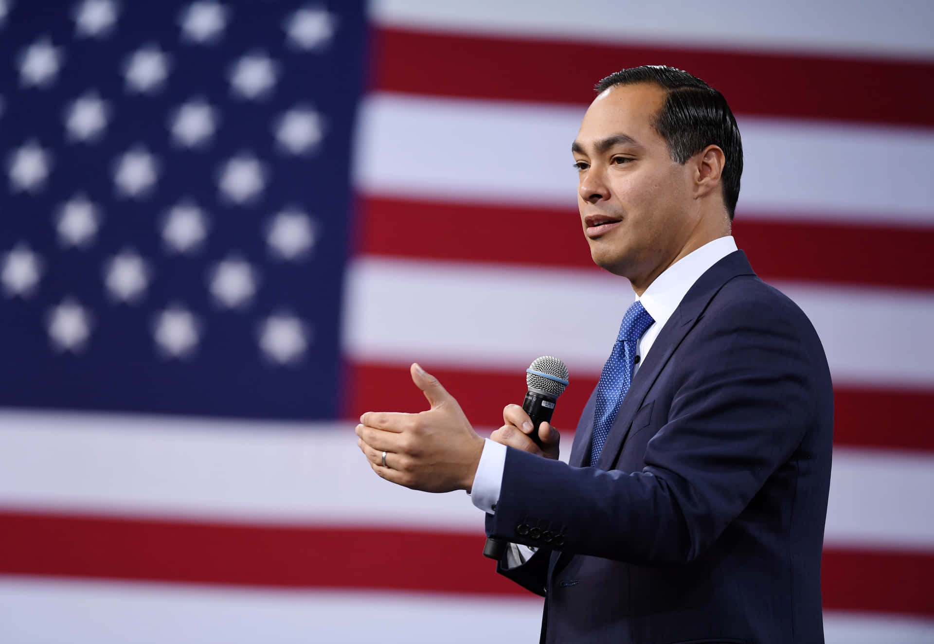 Julian Castro With American Flag Background