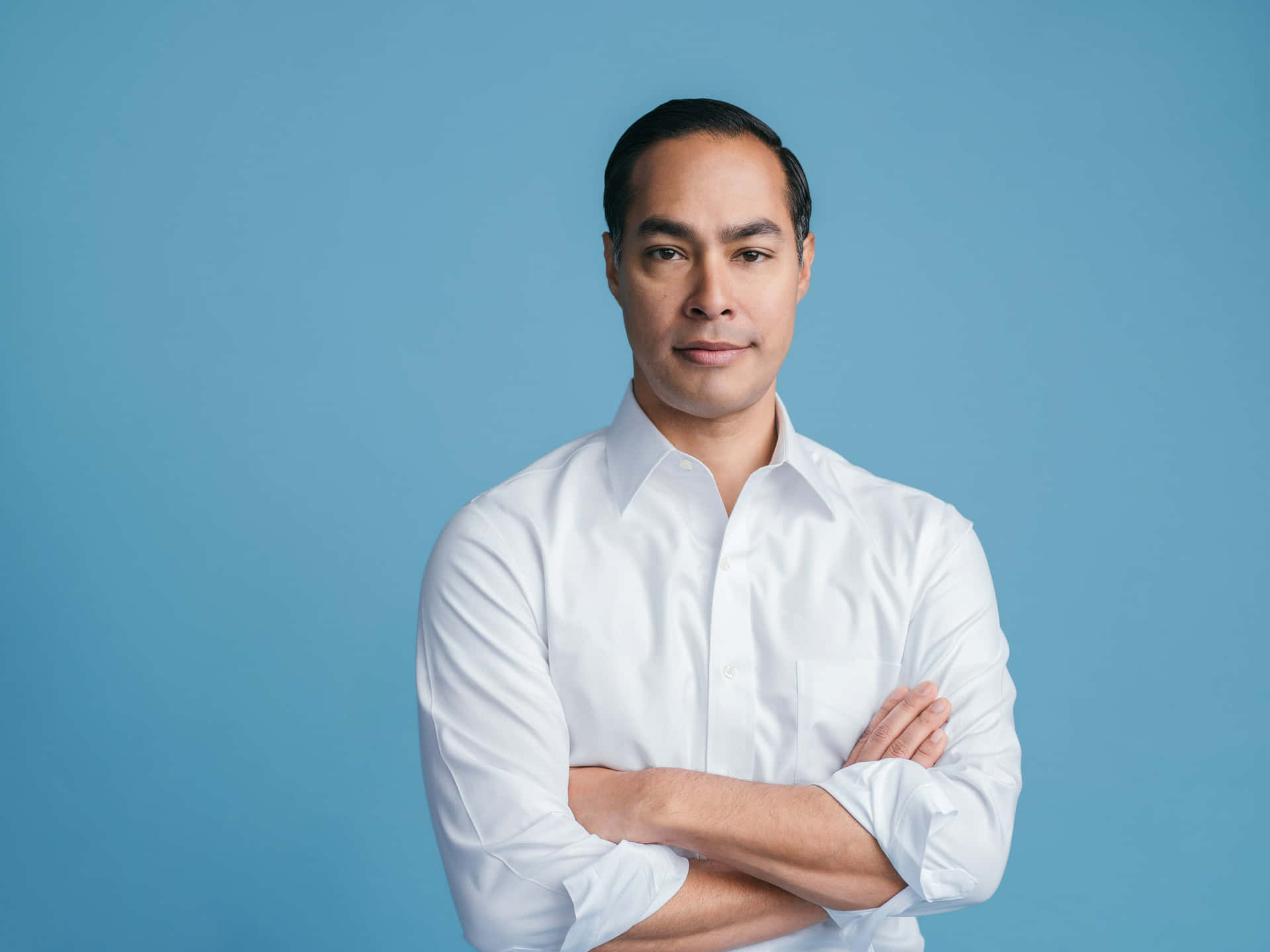 Julian Castro With Blue Background Background