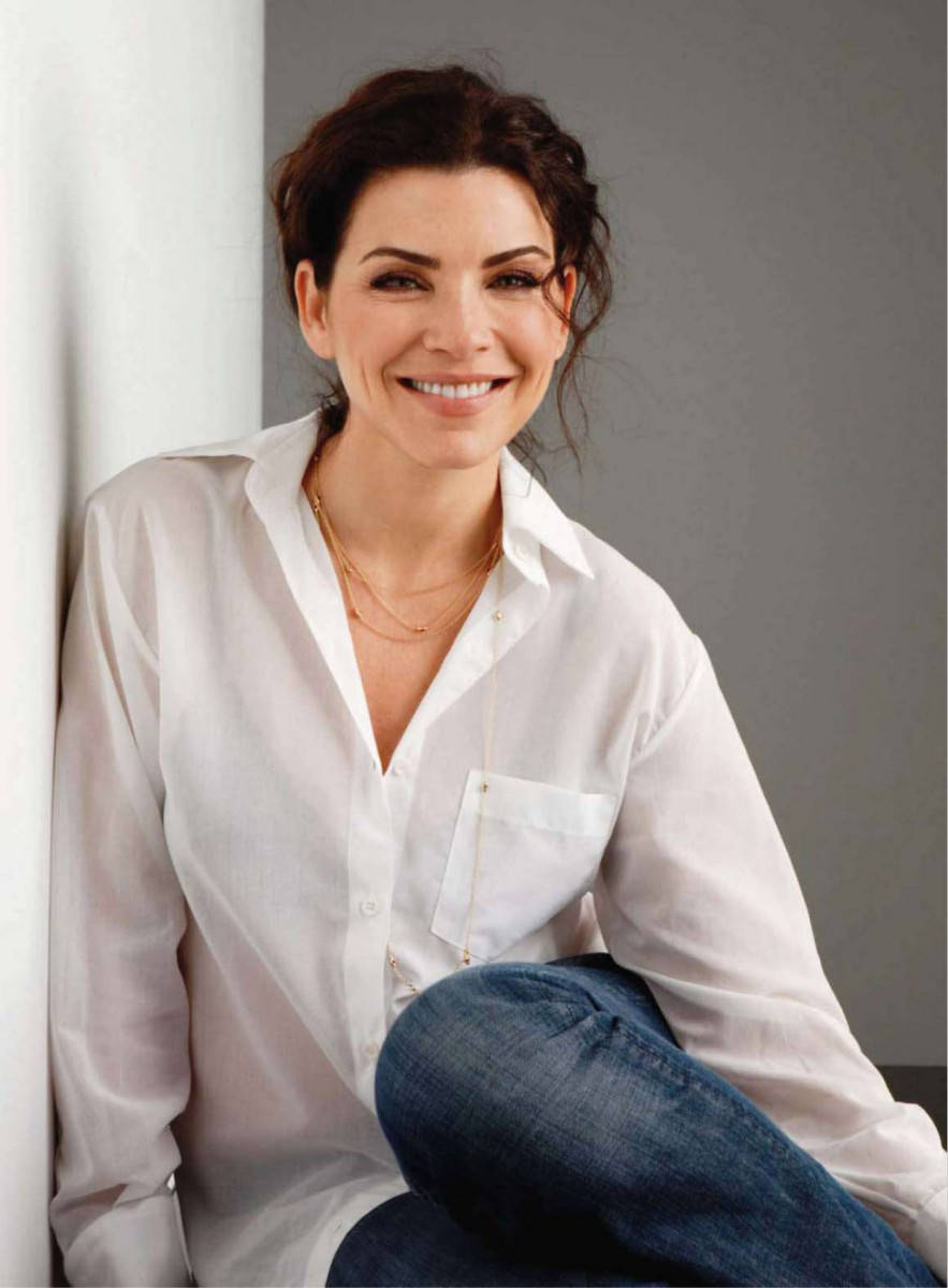 Julianna Margulies In A White Long Sleeve Polo Background