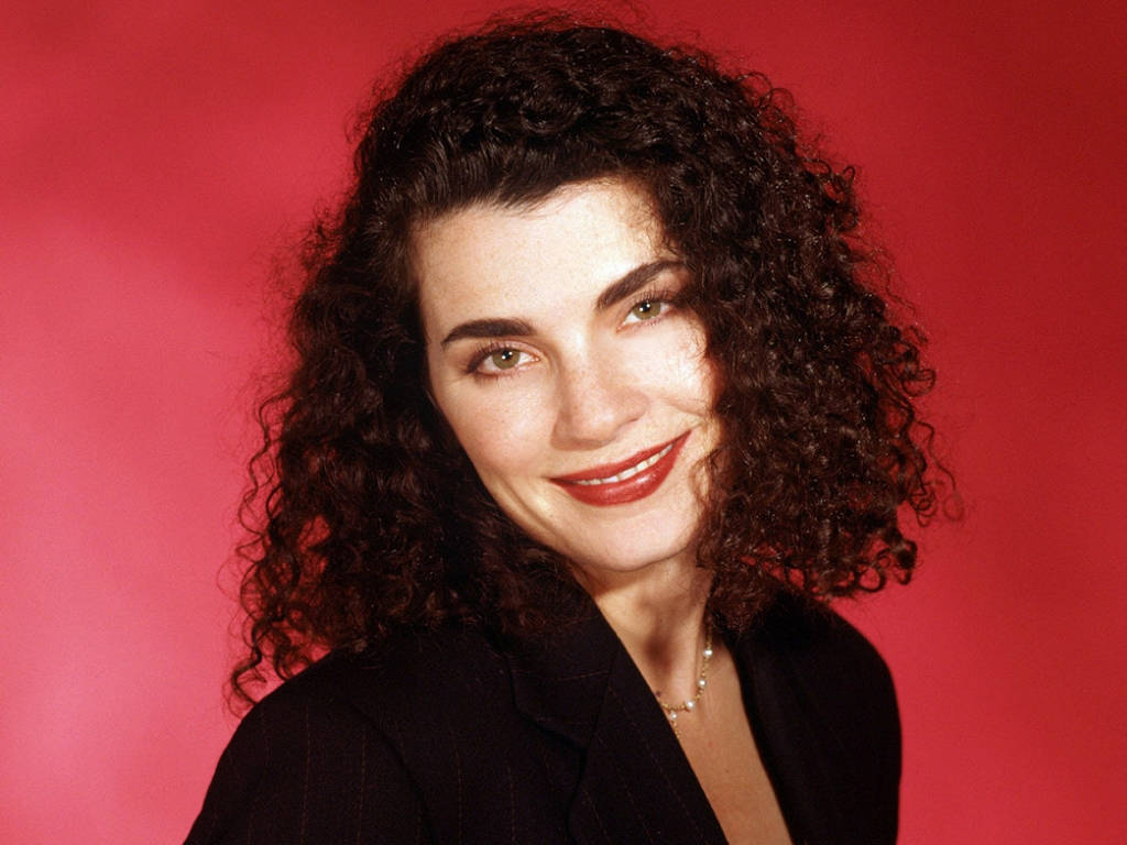 Julianna Margulies In Her Fine Curly Hair Background