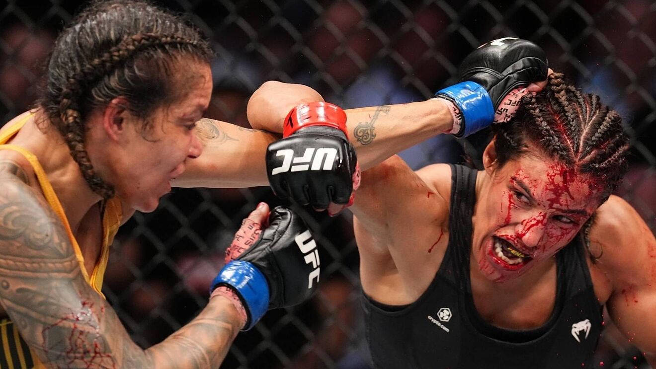 Julianna Peña During A Fierce Ufc Fight Background