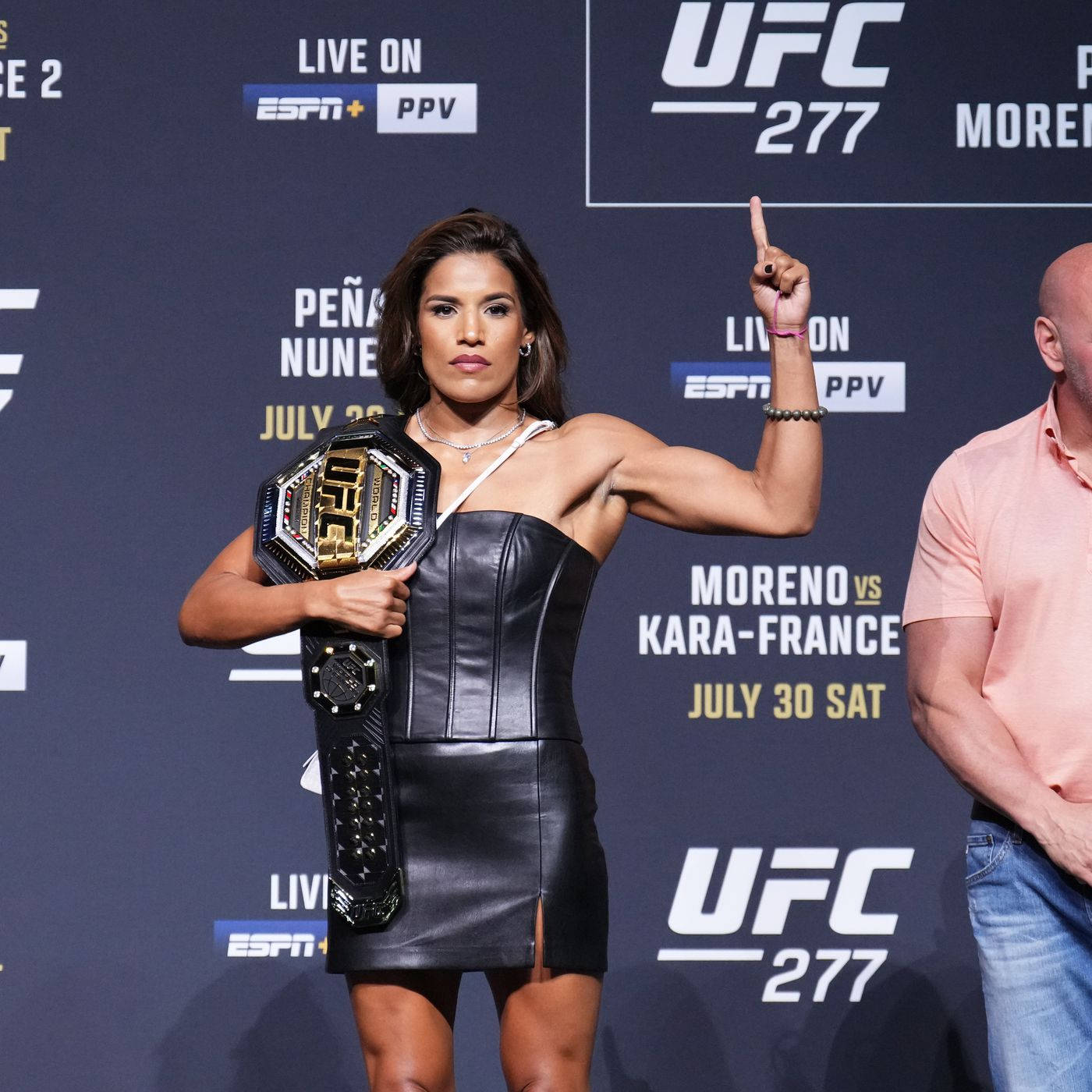 Julianna Peña Holding A Championship Belt