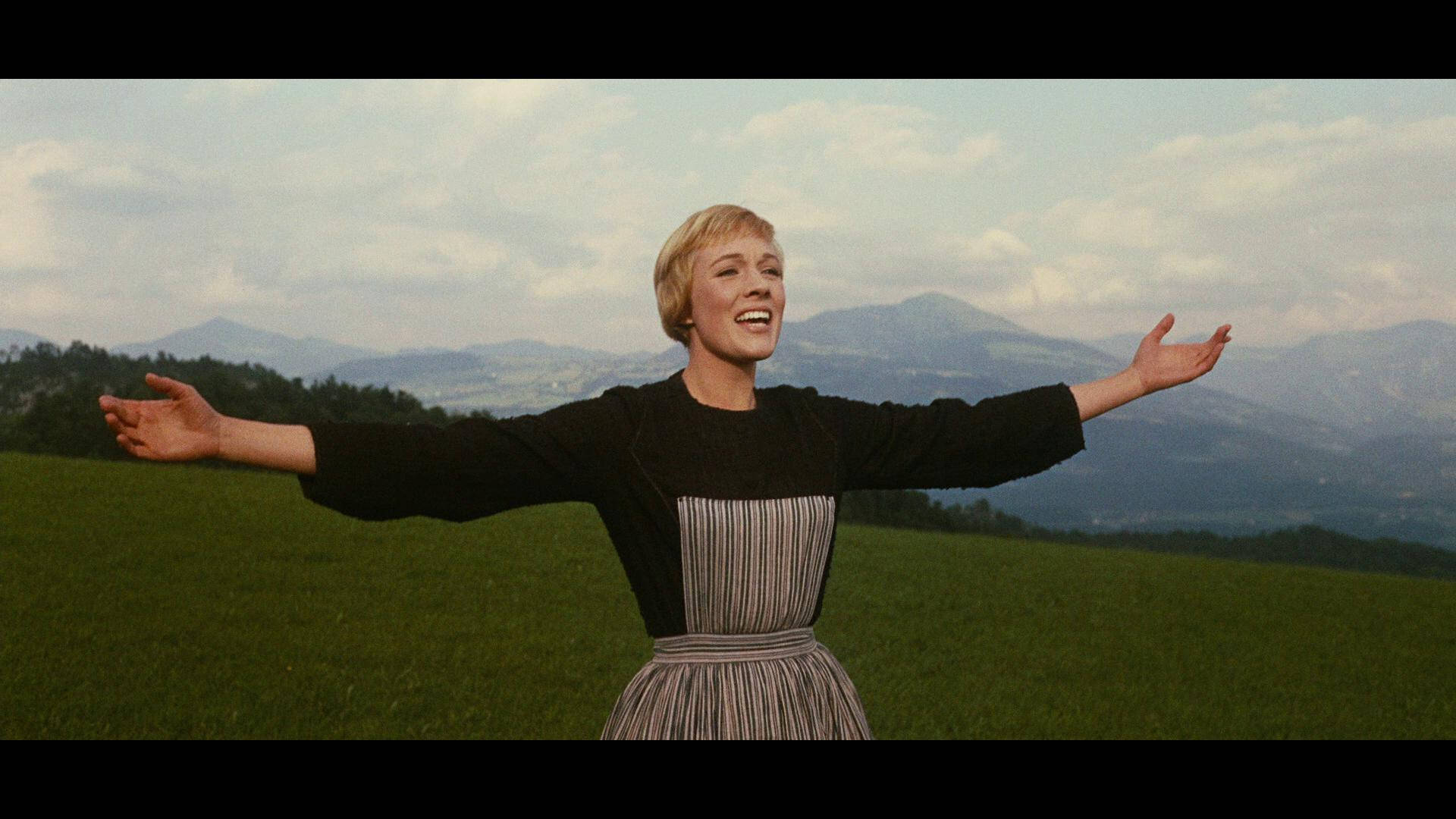 Julie Andrews With Open Arms Background