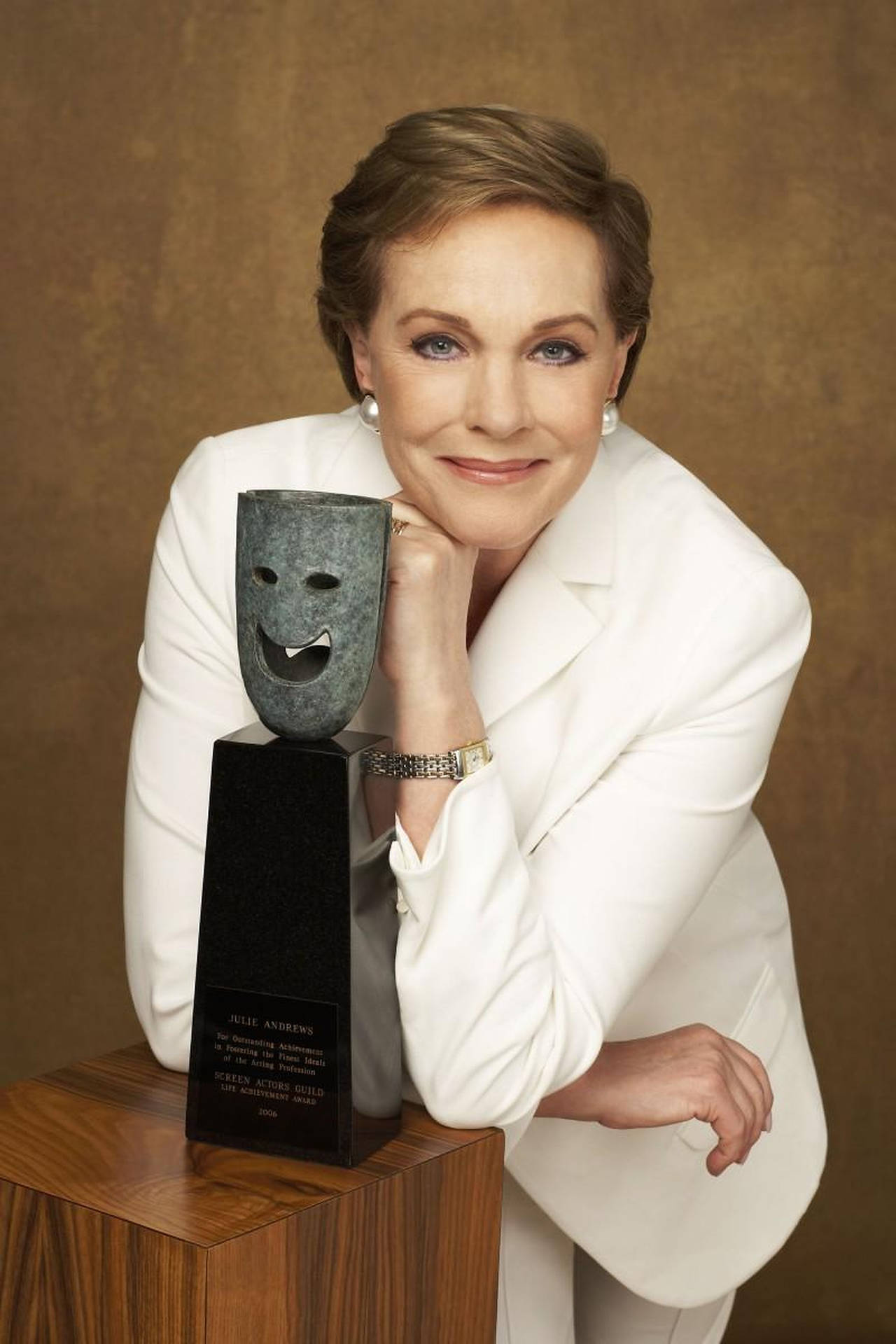 Julie Andrews With Trophy Background