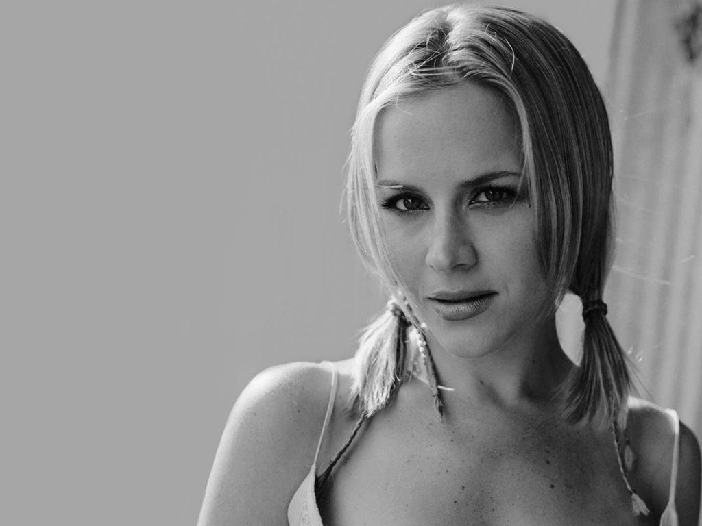 Julie Benz: A Timeless Beauty In Greyscale Background