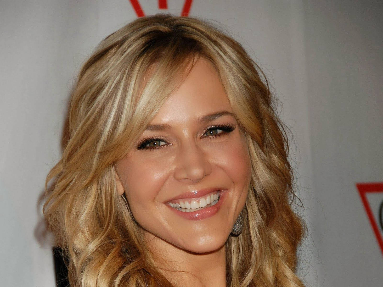 Julie Benz Beaming Smile Background