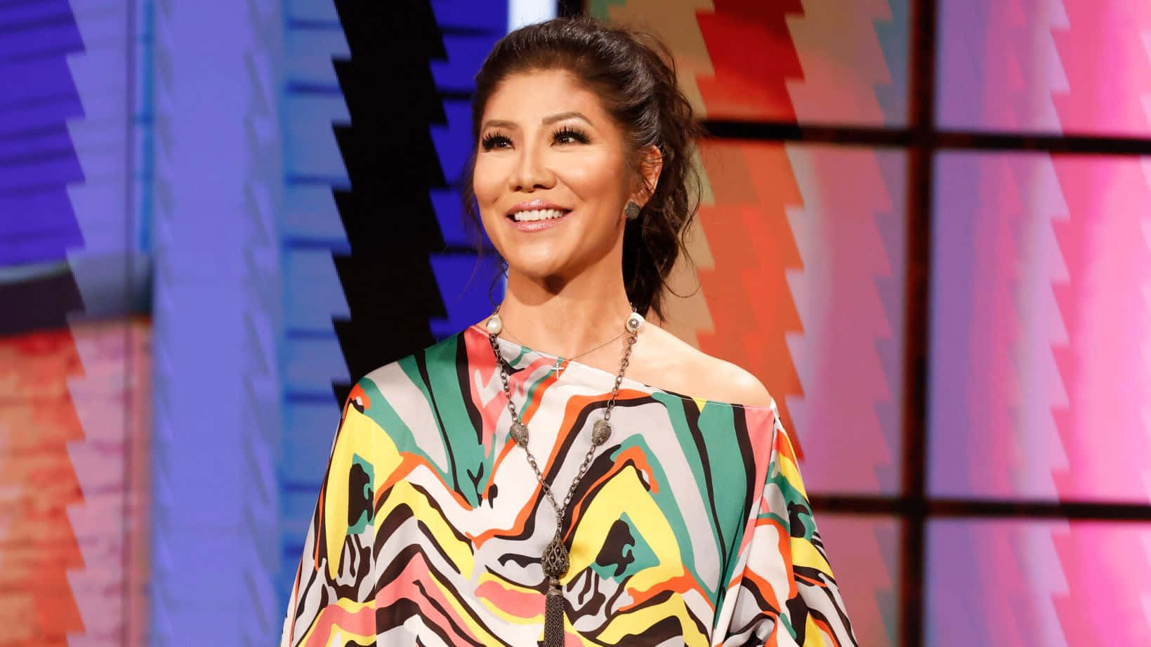 Julie Chen Colorful Outfit Television Show Background