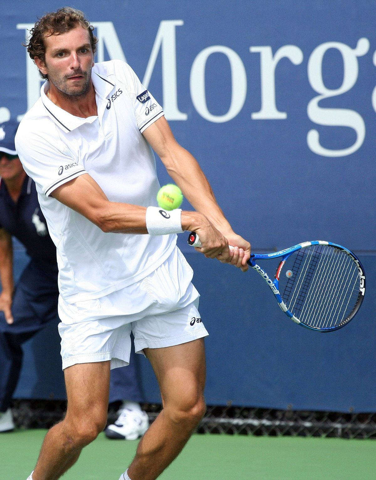 Julien Benneteau About To Hit Ball Background