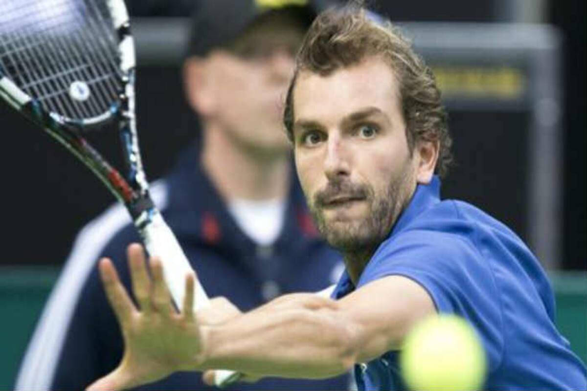 Julien Benneteau Attired In Royal Blue Polo On Court