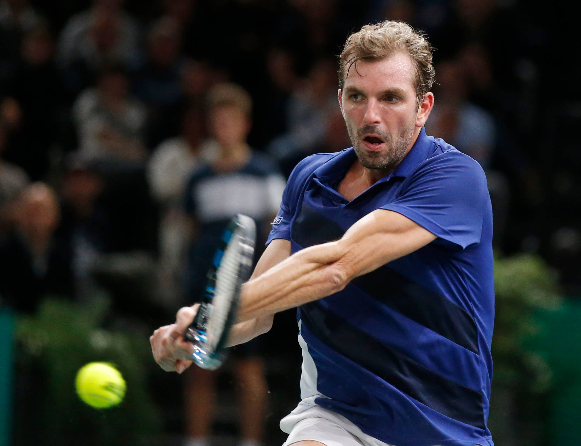 Julien Benneteau Framed In Perfect Two-handed Backhand Stroke Background