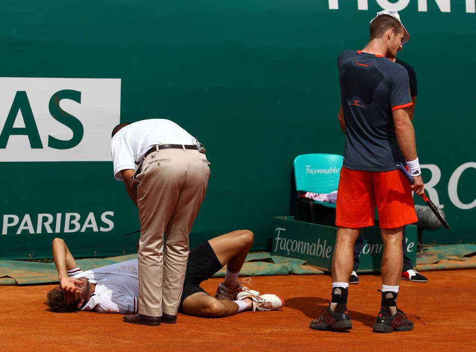 Julien Benneteau In Agony With Fractured Elbow Background