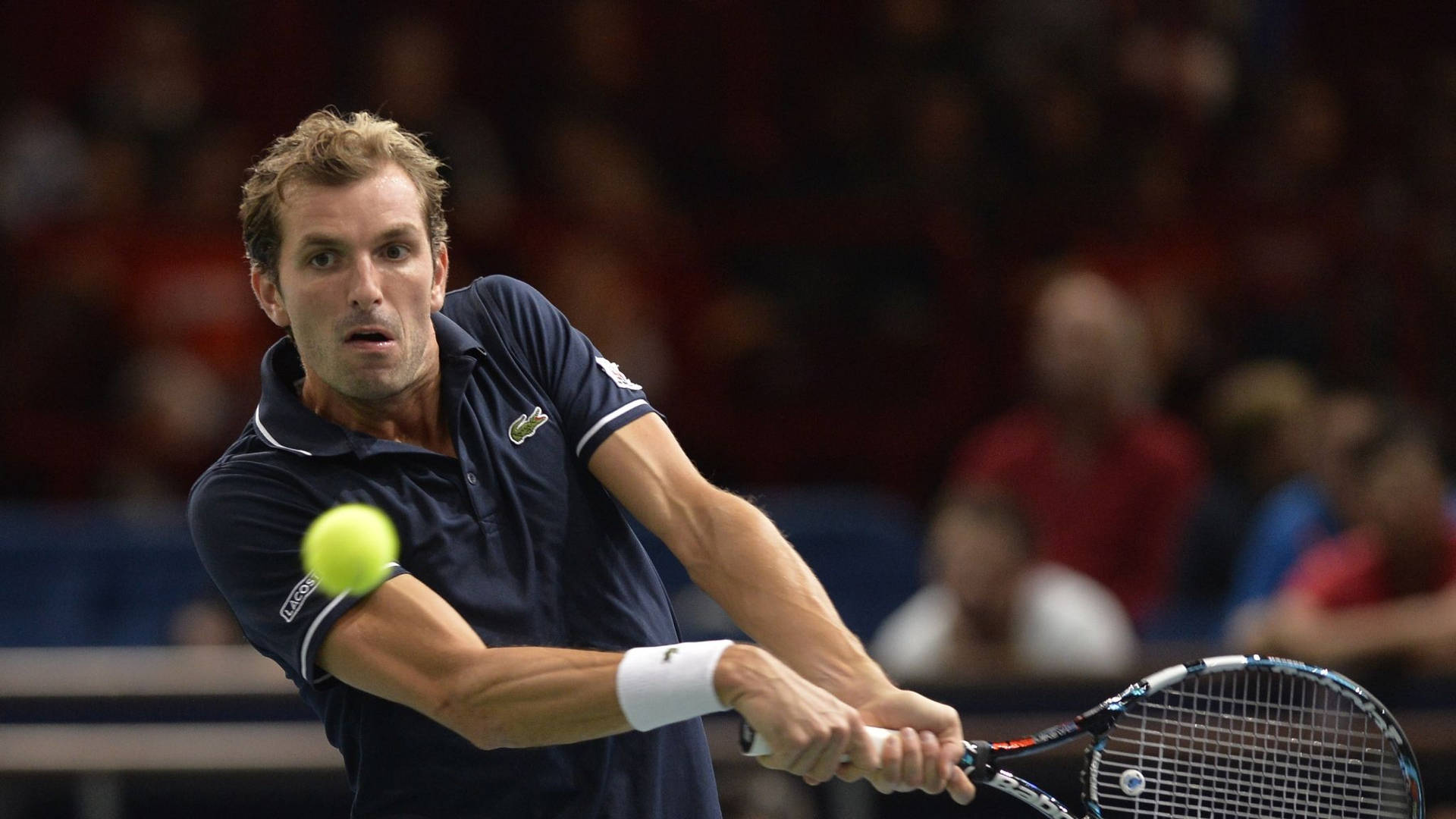 Julien Benneteau In Navy Blue Lacoste Polo Background