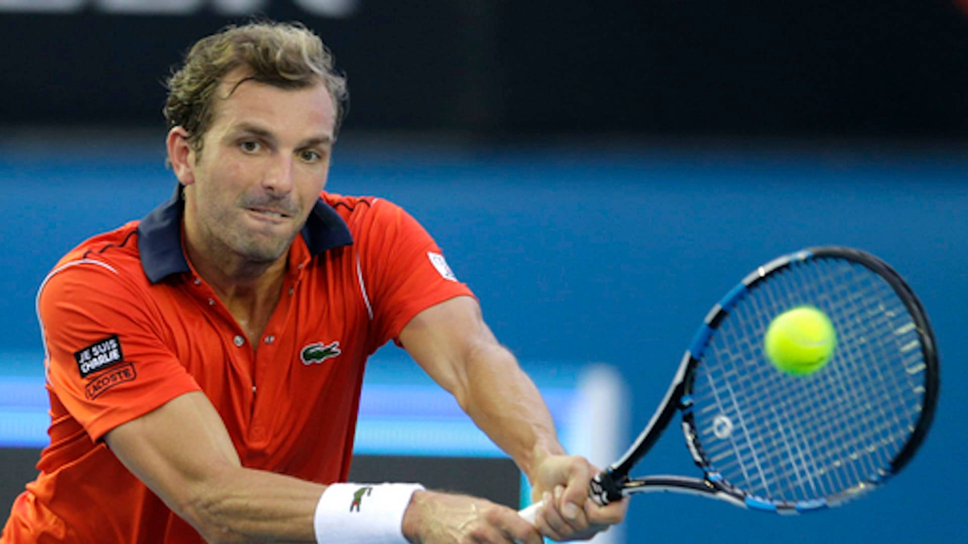 Julien Benneteau In Orange Polo Background