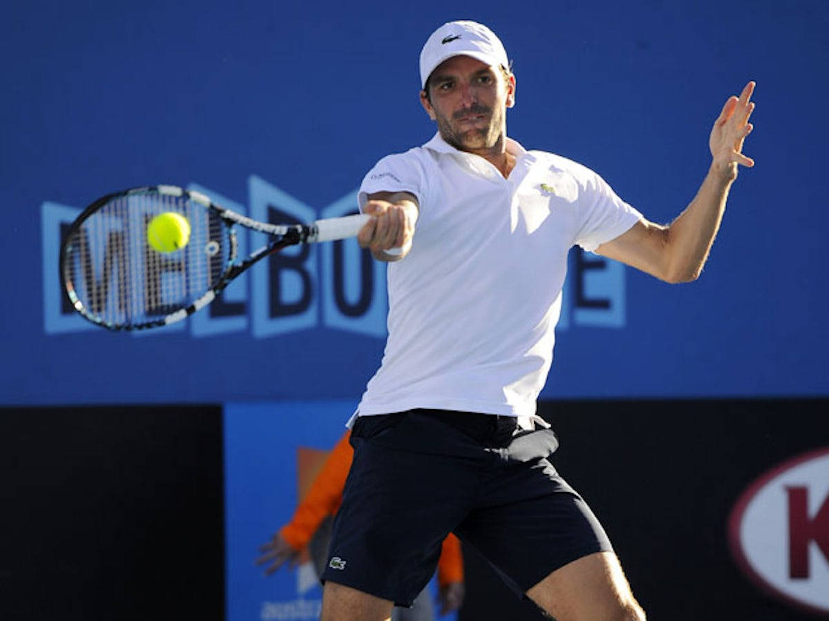 Julien Benneteau In White And Black Tennis Attire