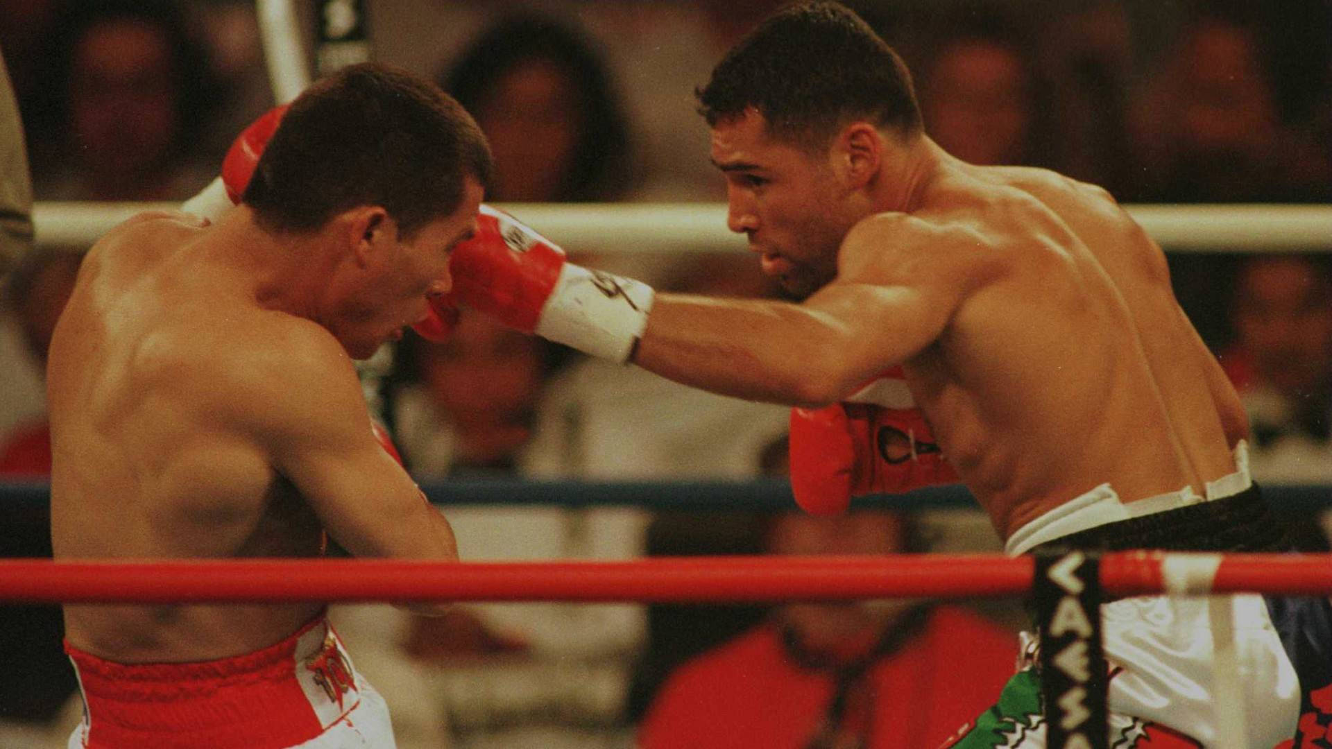 Julio Cesar Chavez Getting Punched Background